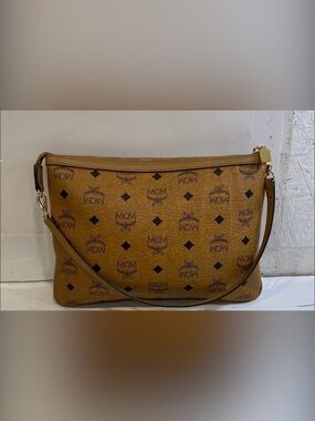 MCM Brown Canvas Interior with Logo Tag